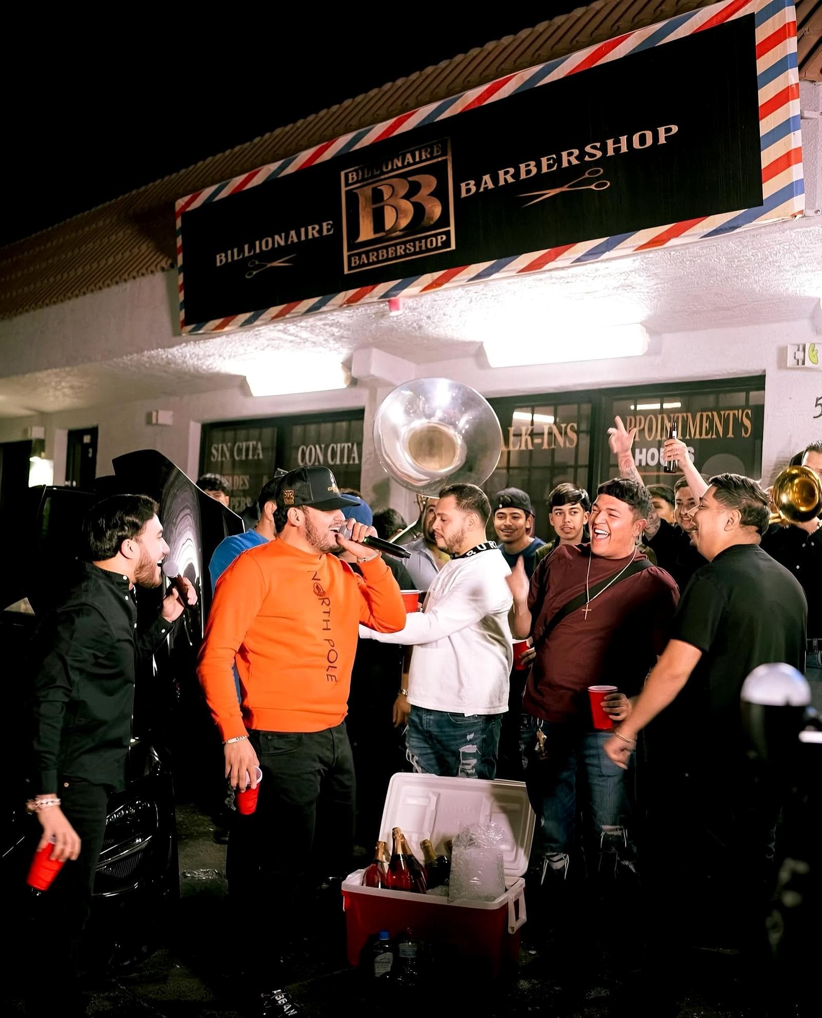 Billionaire Barbershop event night with live music and crowd